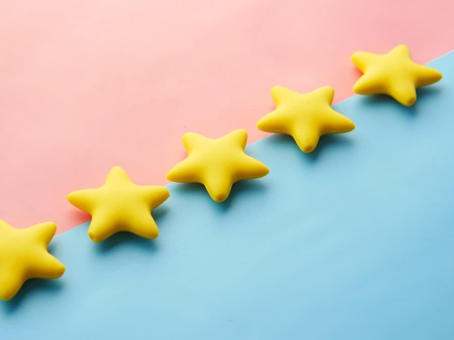 Smartphone displaying a five-star Google review, the outcome of the SkyHigh Reviews automated review generation system